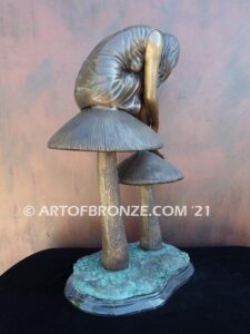 Enchanted Mushroom fairy tale & fantasy bronze statue of beautiful woman sitting on mushrooms