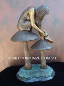 Enchanted Mushroom fairy tale & fantasy bronze statue of beautiful woman sitting on mushrooms