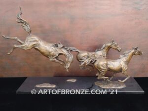 Heaven’s Gate limited edition sculpture of three running horses attached to marble base