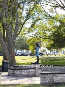 Pledge Allegiance wonderful outdoor bronze sculpture featuring two young kids with right hand on their hearts