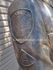 Forever Remembered bronze sculpture of life-size bronze memorial sculpture of police officer Nathan Heidelberg