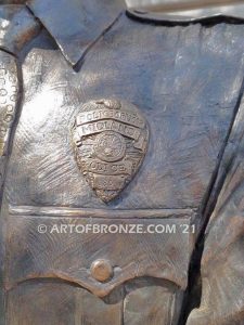 Forever Remembered bronze sculpture of life-size bronze memorial sculpture of police officer Nathan Heidelberg