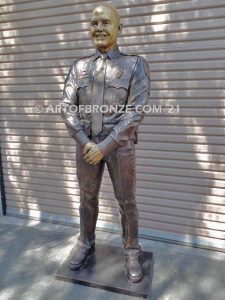 Forever Remembered bronze sculpture of life-size bronze memorial sculpture of police officer Nathan Heidelberg