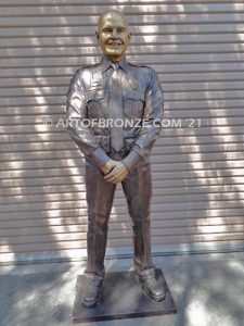 Forever Remembered bronze sculpture of life-size bronze memorial sculpture of police officer Nathan Heidelberg