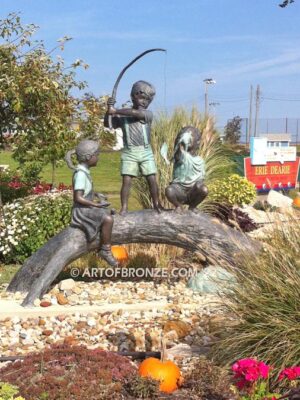 Fun Day outdoor bronze statue of three kids playing on huge bronze arched log