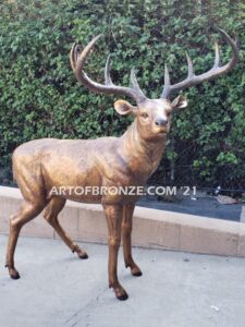 Morning Encounter outdoor monumental bronze buck and doe standing sculptures