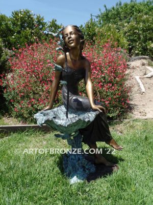 Beautiful Hummingbird bronze sculpture of adorable young girl & hummingbird public artwork