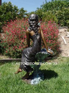 Beautiful Hummingbird bronze sculpture of adorable young girl & hummingbird public artwork