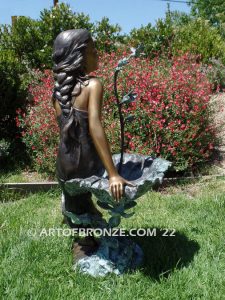 Beautiful Hummingbird bronze sculpture of adorable young girl & hummingbird public artwork