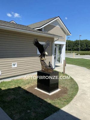 Eagle outdoor monumental statue of eagle landing in nest to baby eaglet