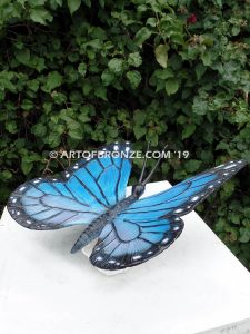 Blue Monarch butterfly and moth statues can be customized to go anywhere