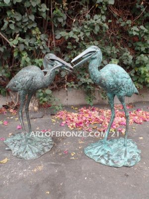 Dinner Time heron pair lost wax casting of pair of cranes for fountain