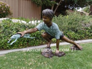 Frog Catching outdoor bronze fountain statue of boy grasping bullfrog that can spray water