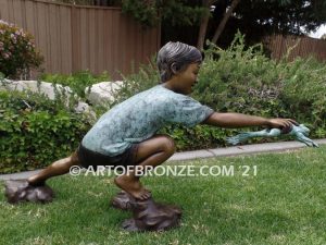 Frog Catching outdoor bronze fountain statue of boy grasping bullfrog that can spray water