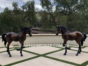 Legacy and Legend San Marcos home bronze sculpture pair of standing right left horse pair