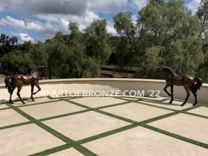 Legacy and Legend San Marcos home bronze sculpture pair of standing right left horse pair