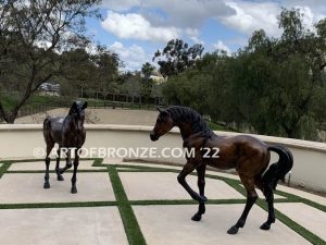 Legacy and Legend San Marcos home bronze sculpture pair of standing right left horse pair