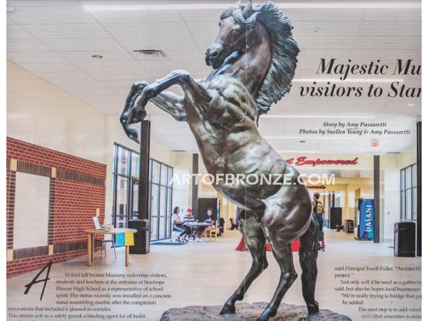 Bronze sculpture of heroic reared horse school mascot