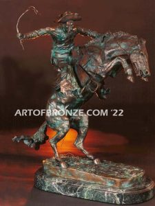 Bronco Buster indoor bronze statue of cowboy on rearing horse