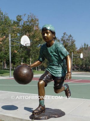 Fast Break bronze sculpture of basketball player dribbling ball and running