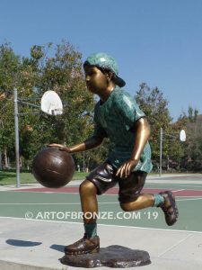 Fast Break bronze sculpture of basketball player dribbling ball and running
