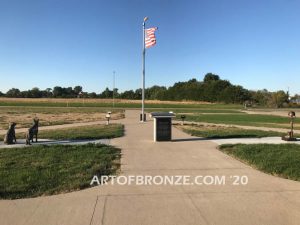 Mississippi Valley Veterans Memorial outdoor monumental bronze statues of Fallen Soldier Battle Cross and two military working dogs