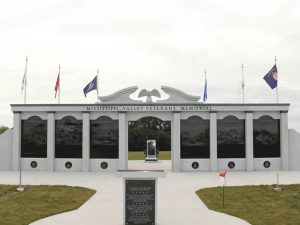 Mississippi Valley Veterans Memorial outdoor monumental bronze statues of Fallen Soldier Battle Cross and two military working dogs