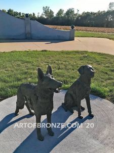 Mississippi Valley Veterans Memorial outdoor monumental bronze statues of Fallen Soldier Battle Cross and two military working dogs