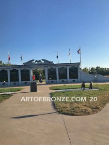 Mississippi Valley Veterans Memorial outdoor monumental bronze statues of Fallen Soldier Battle Cross and two military working dogs