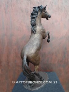 Glorious sculpture of wild reared horse attached to a marble base