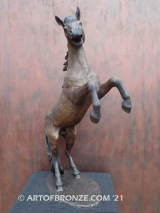 Glorious sculpture of wild reared horse attached to a marble base