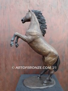 Glorious sculpture of wild reared horse attached to a marble base