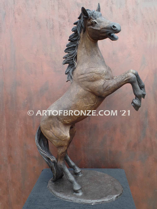 Glorious sculpture of wild reared horse attached to a marble base