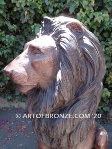 Kings of the Castle high quality cast bronze African lion pair sitting next to each other