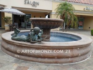 Early Comprehension bronze sculpture of young girl reading her favorite novel