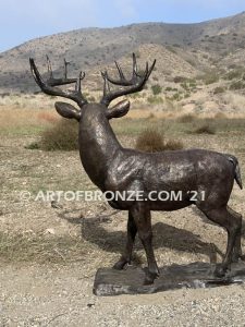 King of the Forest bronze buck sculpture of standing white-tailed deer outdoor monument