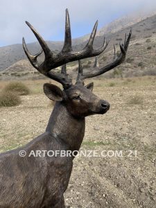 King of the Forest bronze buck sculpture of standing white-tailed deer outdoor monument