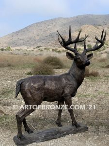 King of the Forest bronze buck sculpture of standing white-tailed deer outdoor monument