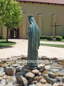 Our Lady of Pontmain bronze sculpture of inspirational Mary holding cross with Jesus Christ above