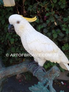 Ready to Entertain outdoor statue of life-size white and yellow crested feathered cockatoos