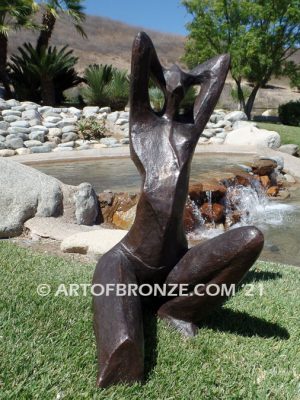 Sunbathing bronze sculpture of exotic and seductive modern/abstract woman for private gallery or public display