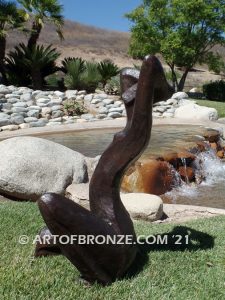 Sunbathing bronze sculpture of exotic and seductive modern/abstract woman for private gallery or public display