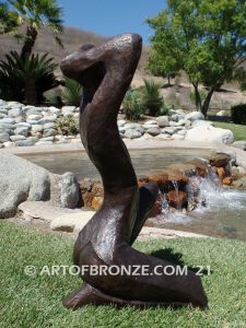 Sunbathing bronze sculpture of exotic and seductive modern/abstract woman for private gallery or public display