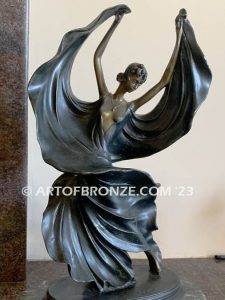 Fascination art deco bronze statue of elegantly dressed fashion model after Louis Icart