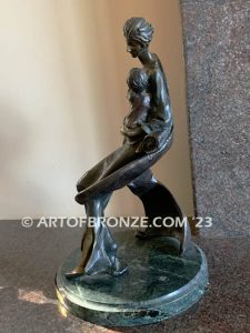 Maternity art deco bronze statue of elegant mother holding her child after Louis Icart