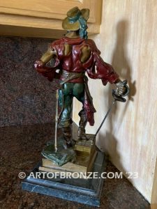 classical standing pirate holding sword with treasure chest under his foot bronze sculpture