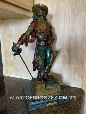 classical standing pirate holding sword with treasure chest under his foot bronze sculpture