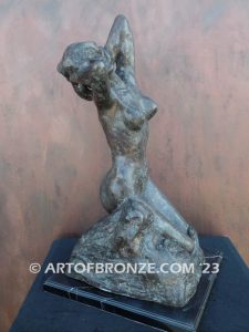 Awakening La Toilette de Venus bronze sculpture of stretching nude female on rock bronze statue