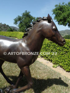 Running Joy bronze sculpture of running foal, filly, colt and yearling horse for ranch or equestrian center