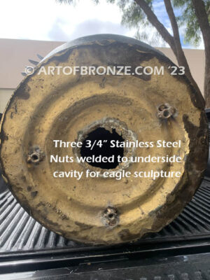 Stainless steel mounting nuts welded to underside of statue to allow fixed installation